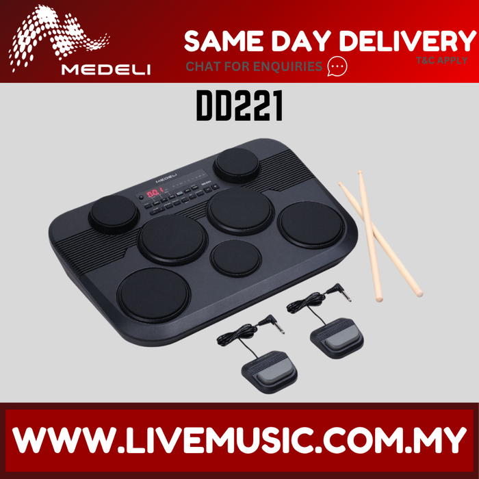 Black portable electronic drum pad with seven pads, control panel, and drumsticks