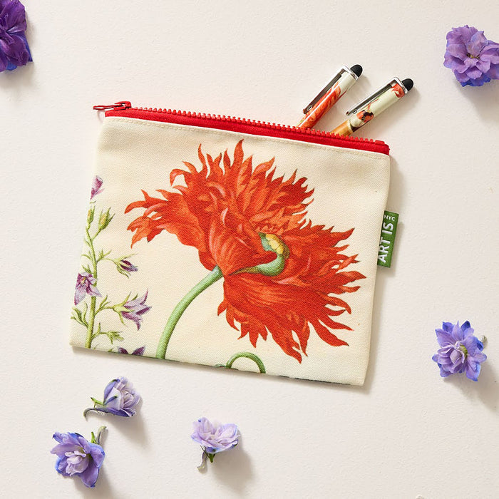 Zip pouch featuring red flower with two pens sticking out